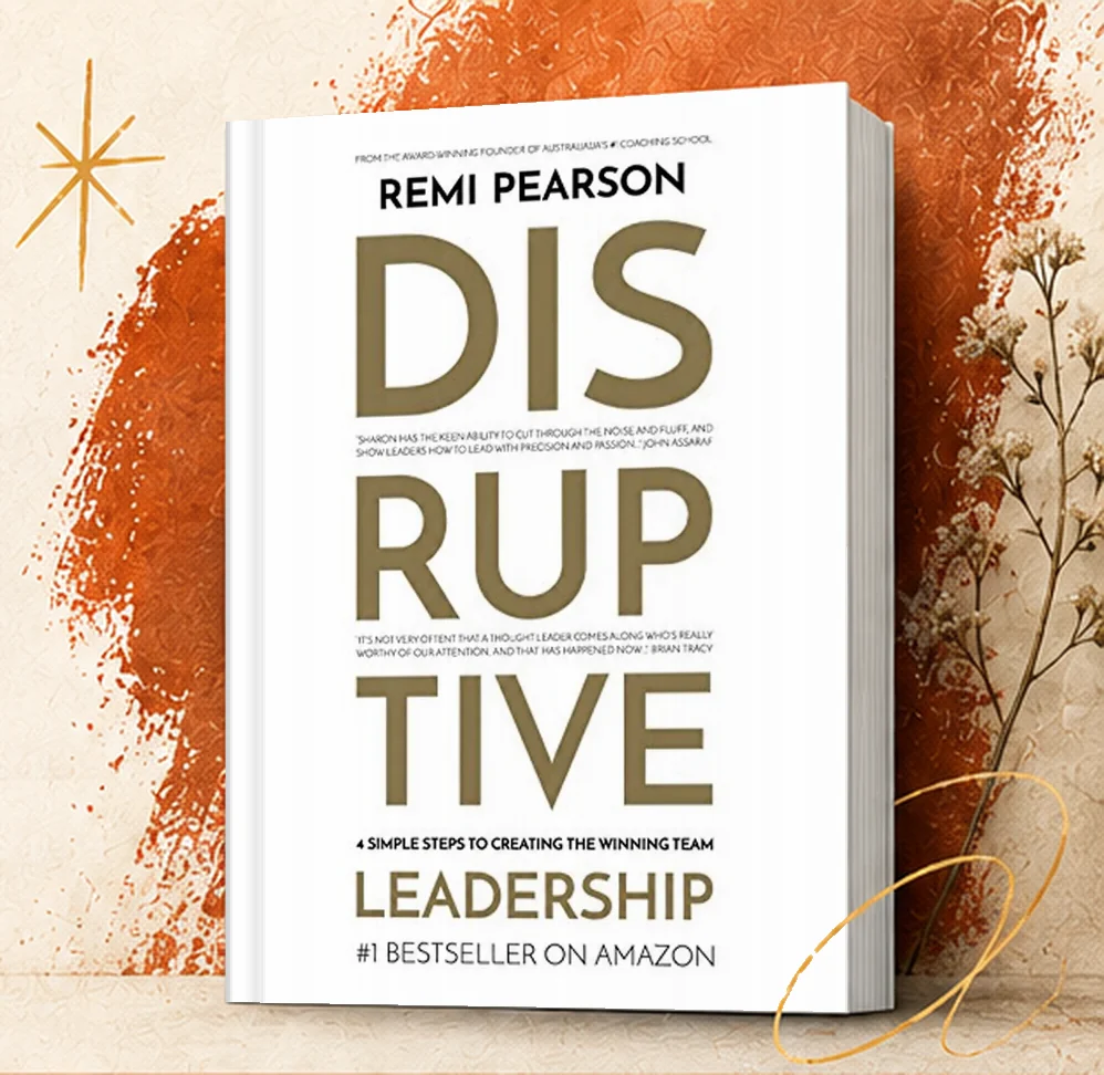 Disruptive Leadership by Remi Pearson: the white cover with DIS RUP TIVE in gold capitals, standing in front of a rust paint stroke and dried flowers